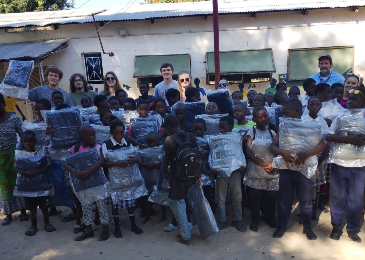 Children and community members in Mwandi